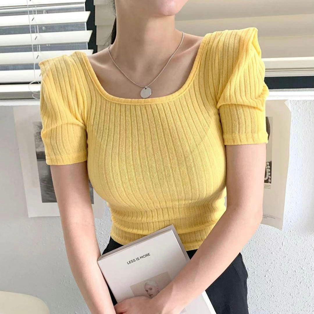 T583 TENSE TOP