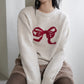 T969 RED RIBBON SWEATER